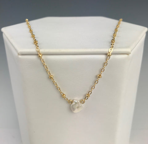 Side to Side Gold Pearl Necklace