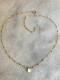 Side to Side Gold Pearl Necklace