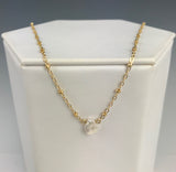 Side to Side Gold Pearl Necklace